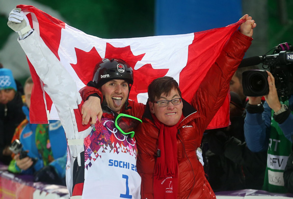 Alex Bilodeau celebrated Monday after winning gold in the men's freestyle skiing moguls at the Sochi Olympics with his brother Frederic, who has cerebral palsy. (Valery Sharifulin/ITAR-TASS/ZUMAPRESS.com/MCT)