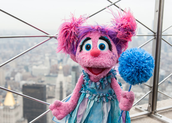 Sesame Street's Abby Cadabby helped light the Empire State Building blue earlier this week in honor of World Autism Awareness Day. The nonprofit behind Sesame Street is launching a new initiative to help educate the public about the developmental disorder. (Gil Vaknin/Sesame Workshop)