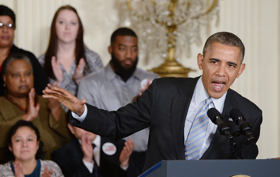 President Barack Obama speaks during a February event where he signed an executive order requiring federal contractors to pay their workers at least $10.10 per hour. This week, the U.S. Department of Labor issued a proposed rule on the plan which would apply to federal contract employees with disabilities who were previously paid less than minimum wage. (Olivier Douliery/Abaca Press/MCT)