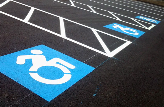 An effort to adopt a more in-motion symbol for accessibility is gaining traction with New York requiring all new signage in the state to utilize the 