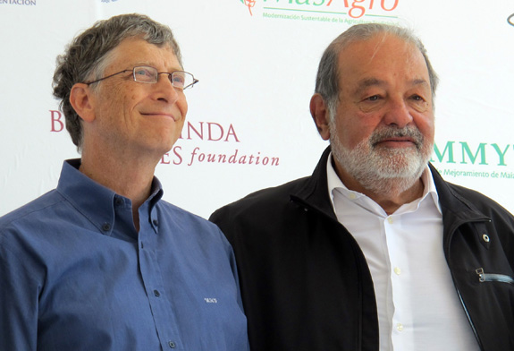 Mexican billionaire Carlos Slim, right, is teaming up with Best Buddies to encourage more businesses to hire people with developmental disabilities. Slim and Bill Gates, left, regularly hold the top two slots on Forbes' list of the world's richest people. (Tim Johnson/MCT)