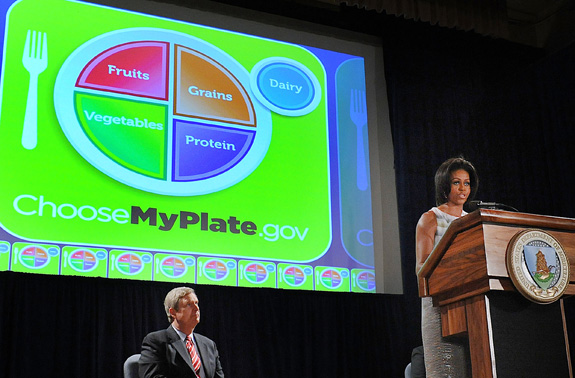 First Lady Michelle Obama and Agriculture Secretary Tom Vilsack, left, unveiled a new healthy eating symbol, 