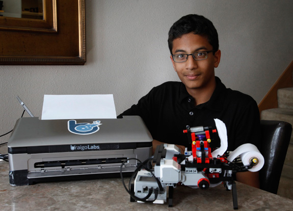 Shubham Banerjee poses with the Braille printer he built out of Legos and a prototype of a Braille printer, left, that he hopes to get manufactured. (Patrick Tehan/Bay Area News Group/MCT)