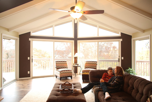 With her son Devin's needs in mind, A.J. Paton-Wildes chose neutral colors for the walls and new flooring in the living room of their Oak Park Heights, Minn., home. As an interior designer, Paton-Wildes incorporates her personal experience with Devin, who has autism, to help create calming spaces for those on the spectrum. (Jeff Wheeler/Minneapolis Star Tribune/TNS)