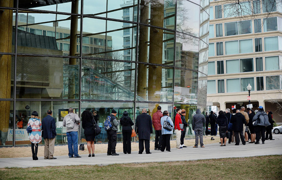 Job seekers wait to enter a career fair in the nation's capital. The federal government is more than halfway toward achieving a goal of adding 100,000 new employees with disabilities. (Olivier Douliery/Abaca Press/TNS)